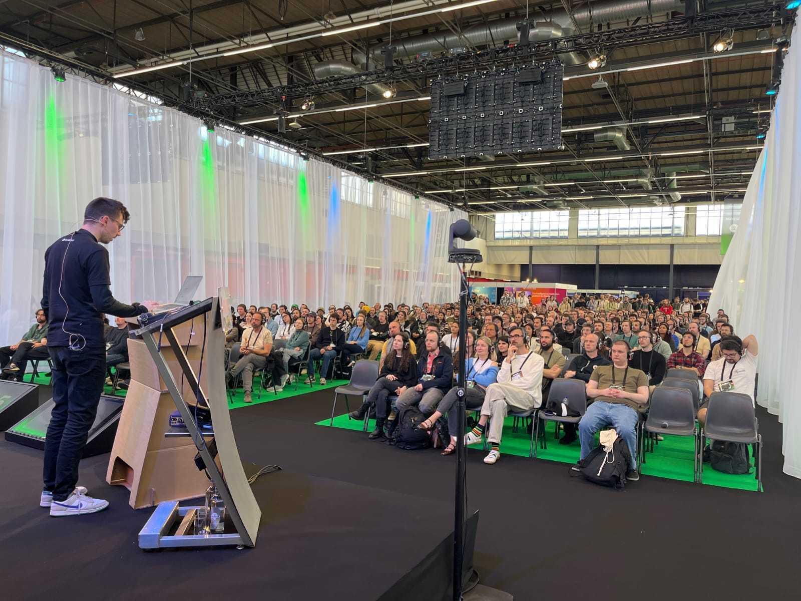 Full room watching the talk from the stage at DevWorld Conference 2026, RAI Amsterdam