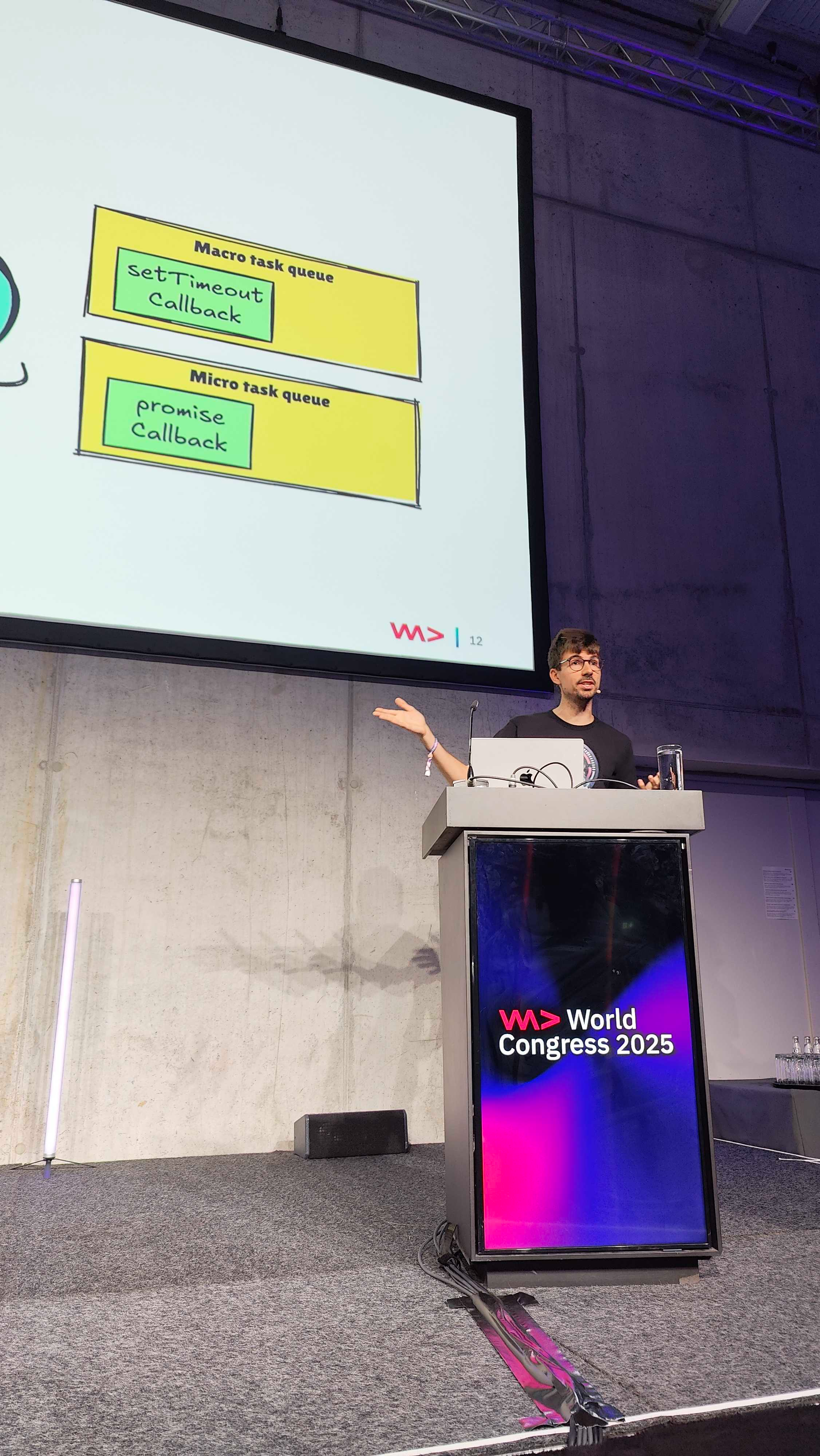 Dani Coll presenting at WeAreDevelopers World Congress 2025 foreground